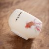 كوب شاي سيراميك أبيض مزخرف بأسماك الكوي White Ceramic Koi Fish Teacup