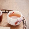 كوب شاي سيراميك أبيض مزخرف بأسماك الكوي White Ceramic Koi Fish Teacup
