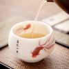 كوب شاي سيراميك أبيض مزخرف بأسماك الكوي White Ceramic Koi Fish Teacup