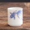 كوب شاي سيراميك أبيض مزخرف بأسماك الكوي White Ceramic Koi Fish Teacup