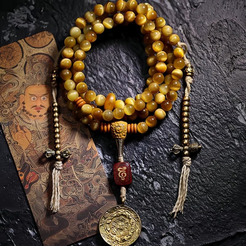 سوار يد من خرز مالا 108 حبة من عين النمر مع شرابة دورجي 108 Mala Beads Tiger Eye Dorje Tassel Bracelet