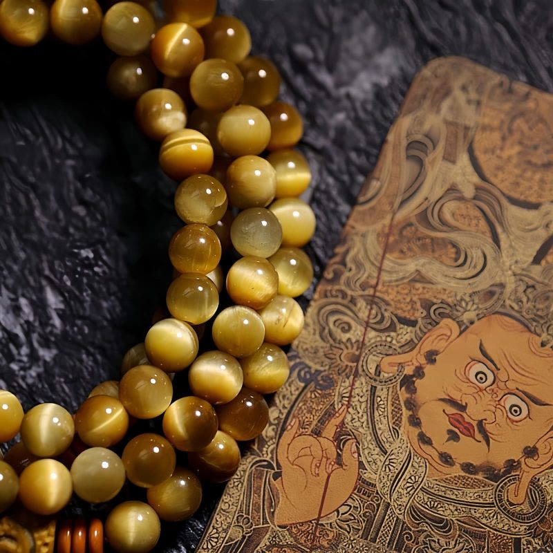 سوار يد من خرز مالا 108 حبة من عين النمر مع شرابة دورجي 108 Mala Beads Tiger Eye Dorje Tassel Bracelet