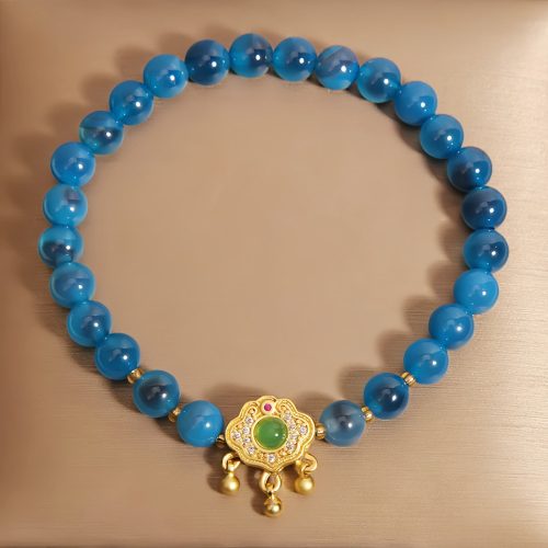 Pulsera con dije de cerradura china y ágata azul caramelo Pulsera con dije de cerradura china y ágata azul caramelo