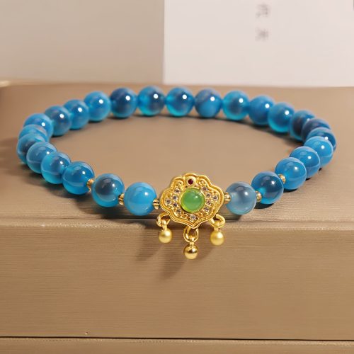 Pulsera con dije de cerradura china y ágata azul caramelo Pulsera con dije de cerradura china y ágata azul caramelo