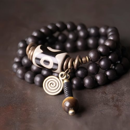 Pulsera de Protección con Cuentas Dzi de Ébano y Cobre Pulsera de Protección con Cuentas Dzi de Ébano y Cobre
