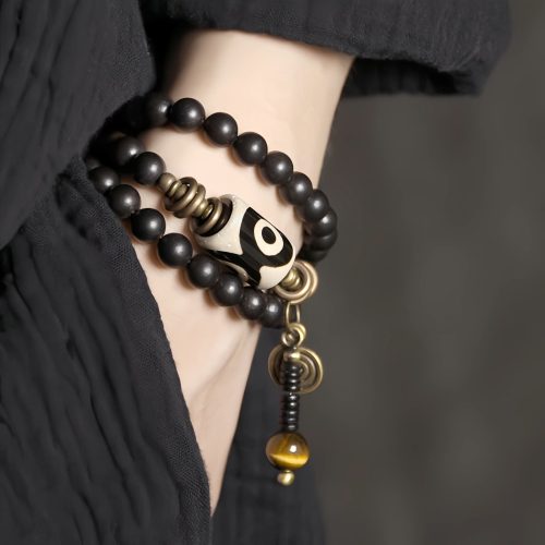 Pulsera de Protección con Cuentas Dzi de Ébano y Cobre Pulsera de Protección con Cuentas Dzi de Ébano y Cobre