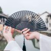 مروحة قابلة للطي من أوراق الخيزران السوداء الحريرية Silk Black Bamboo Leaf Folding Fan