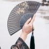 مروحة قابلة للطي من أوراق الخيزران السوداء الحريرية Silk Black Bamboo Leaf Folding Fan