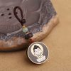 Llave de Avalokitesvara de Madera de Ébano con Om Mani Padme Hum Ebony Wood Avalokitesvara Keychain with Om Mani Padme Hum