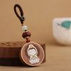 Llave de Avalokitesvara de Madera de Ébano con Om Mani Padme Hum Ebony Wood Avalokitesvara Keychain with Om Mani Padme Hum