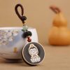 Llave de Avalokitesvara de Madera de Ébano con Om Mani Padme Hum Ebony Wood Avalokitesvara Keychain with Om Mani Padme Hum