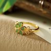 Anillo de Prosperidad de Jade de Hetian en Plata 925 con Flor de Oro Hetian Jade Prosperity Ring in 925 Silver with Gold Flower