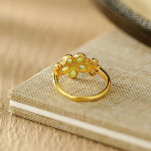 Anillo de Prosperidad de Jade de Hetian en Plata 925 con Flor de Oro Anillo de Prosperidad de Jade de Hetian en Plata 925 con Flor de Oro
