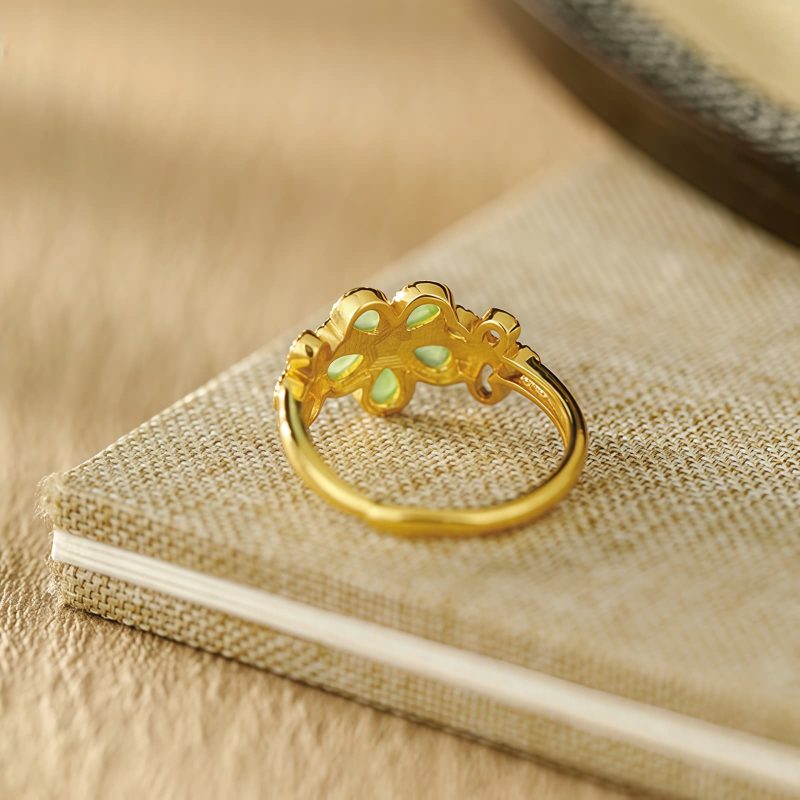Anillo de Prosperidad de Jade de Hetian en Plata 925 con Flor de Oro Hetian Jade Prosperity Ring in 925 Silver with Gold Flower