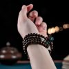 Pulsera de 108 Cuentas Mala de Agarwood y Fuerza 108 Mala Beads Agarwood Strength Bracelet