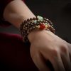 سوار توازن خرز مالا 108 من عود كاليمنتان وعنبر 108 Mala Beads Agarwood Amber Balance Bracelet