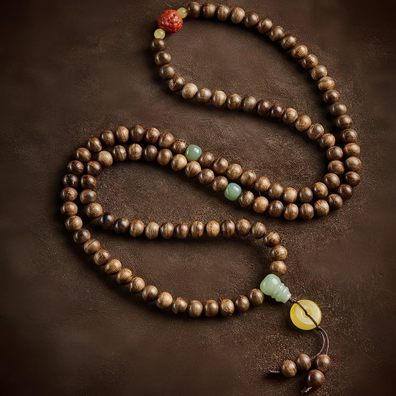 سوار توازن خرز مالا 108 من عود كاليمنتان وعنبر 108 Mala Beads Agarwood Amber Balance Bracelet