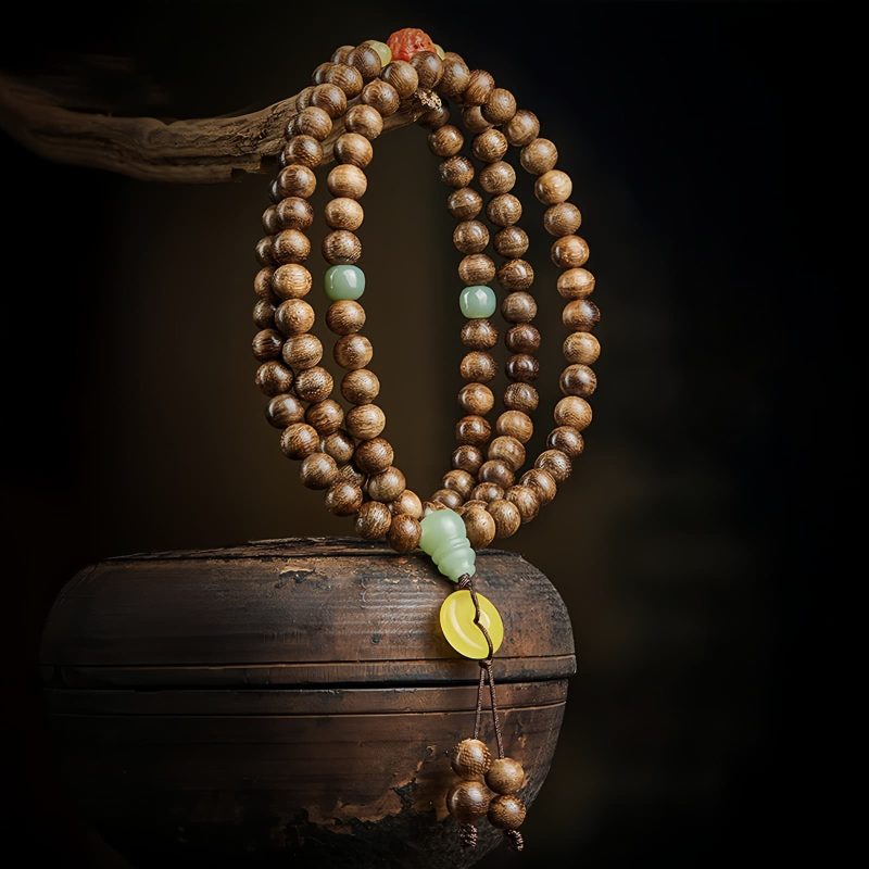 سوار توازن خرز مالا 108 من عود كاليمنتان وعنبر 108 Mala Beads Agarwood Amber Balance Bracelet