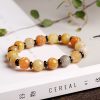 Pulsera de Prosperidad con Jade de Seda Dorada y Loto Golden Silk Jade Lotus Prosperity Bracelet
