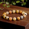 Pulsera de Prosperidad con Jade de Seda Dorada y Loto Golden Silk Jade Lotus Prosperity Bracelet