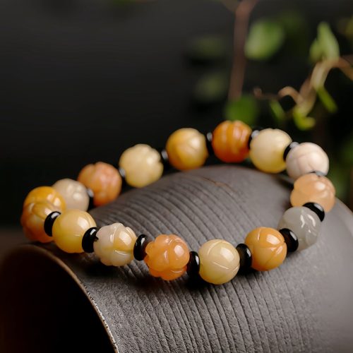 Pulsera de Prosperidad con Jade de Seda Dorada y Loto Pulsera de Prosperidad con Jade de Seda Dorada y Loto