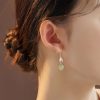 Aretes colgantes de hoja de bambú con jade de Hetian Hetian Jade Bamboo Leaf Dangle Earrings