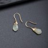 أقراط من حجر هيتيان اليشم على شكل زهرة ماغنوليا المتدلية Hetian Jade Magnolia Drop Earrings