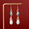 Aretes colgantes con flor de magnolia de jade Jade Magnolia Flower Dangle Earrings