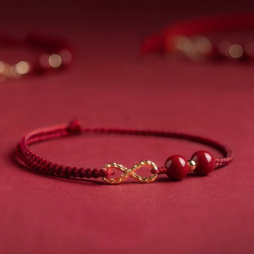 Pulsera y Tobillera Ajustable con Símbolo de Infinito en Cinabrio y Oro de 14K Pulsera y Tobillera Ajustable con Símbolo de Infinito en Cinabrio y Oro de 14K