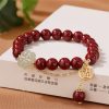 Pulsera de Trébol de la Suerte con Cinabrio y Jade de Hetian Cinnabar & Hetian Jade Lucky Clover Bracelet