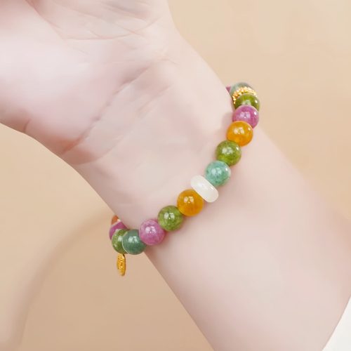 Pulsera con dije de carácter Fu y turmalina multicolor Pulsera con dije de carácter Fu y turmalina multicolor