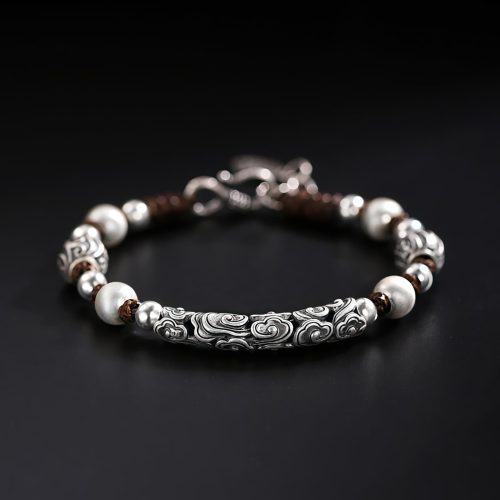 Pulsera Tibetana de Nube Auspiciosa en Cobre y Plata Pulsera Tibetana de Nube Auspiciosa en Cobre y Plata