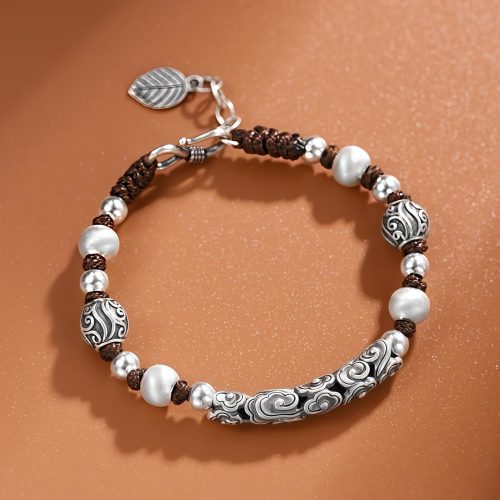 Pulsera Tibetana de Nube Auspiciosa en Cobre y Plata Pulsera Tibetana de Nube Auspiciosa en Cobre y Plata