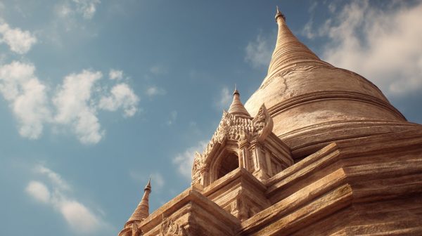 A majestic ancient Stupa under a clear sky